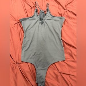 Buckle bodysuit